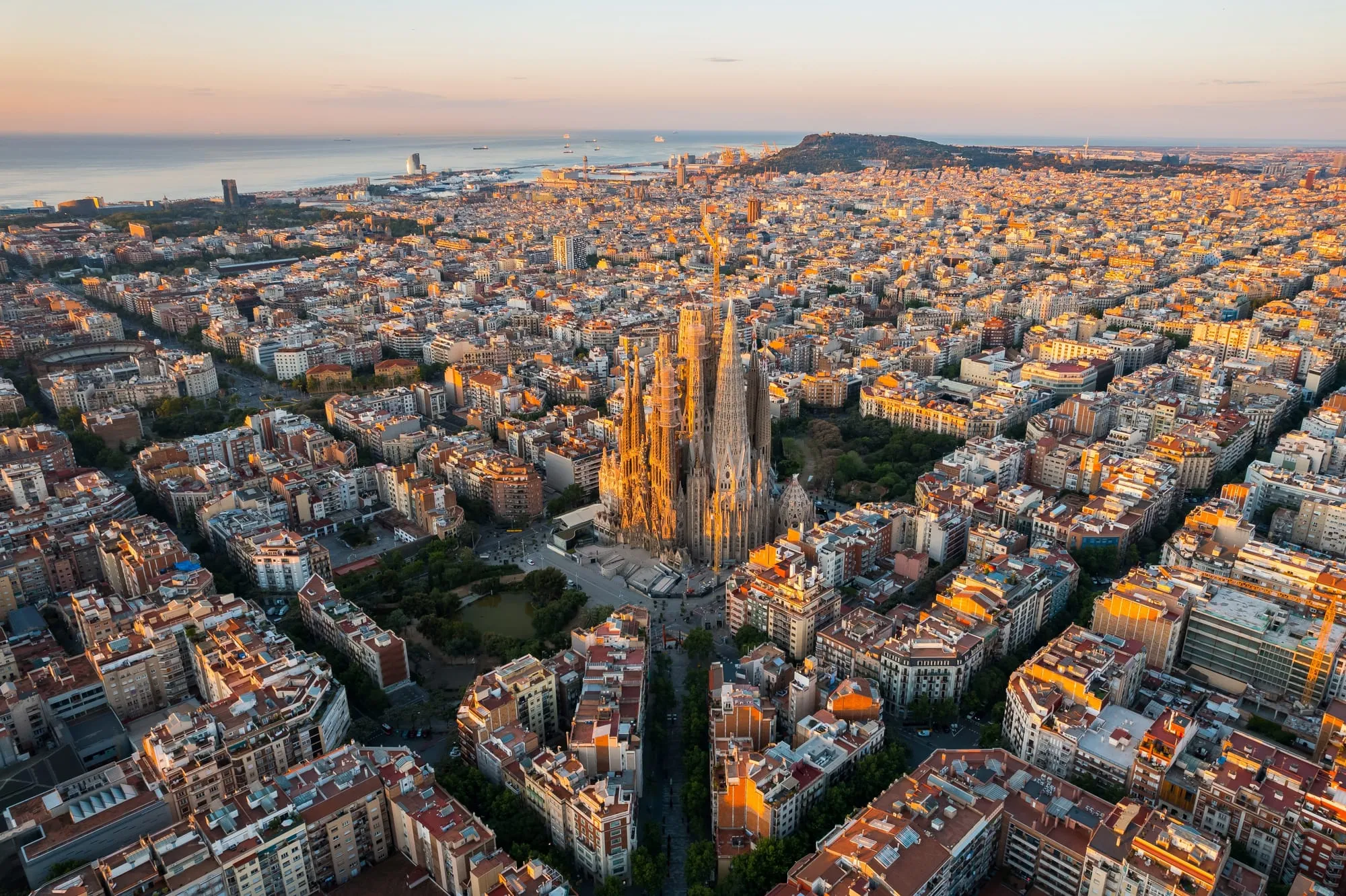 Aerial view of Barcelona with the Sagrada Família rising above the city grid